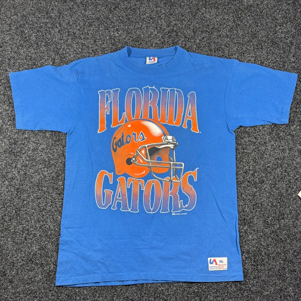 Vintage 1990s Florida Gators NCAA Football T-Shirt XL Blue helmet Graphic